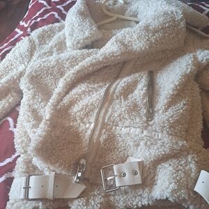 No brand coat authentic material. Warm.